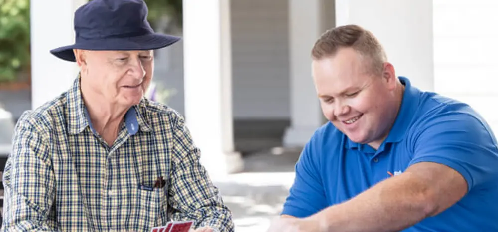 Caregiver review session outlining home safety for senior patient