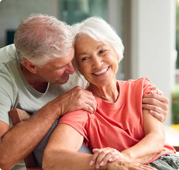 Senior couple embracing warmly