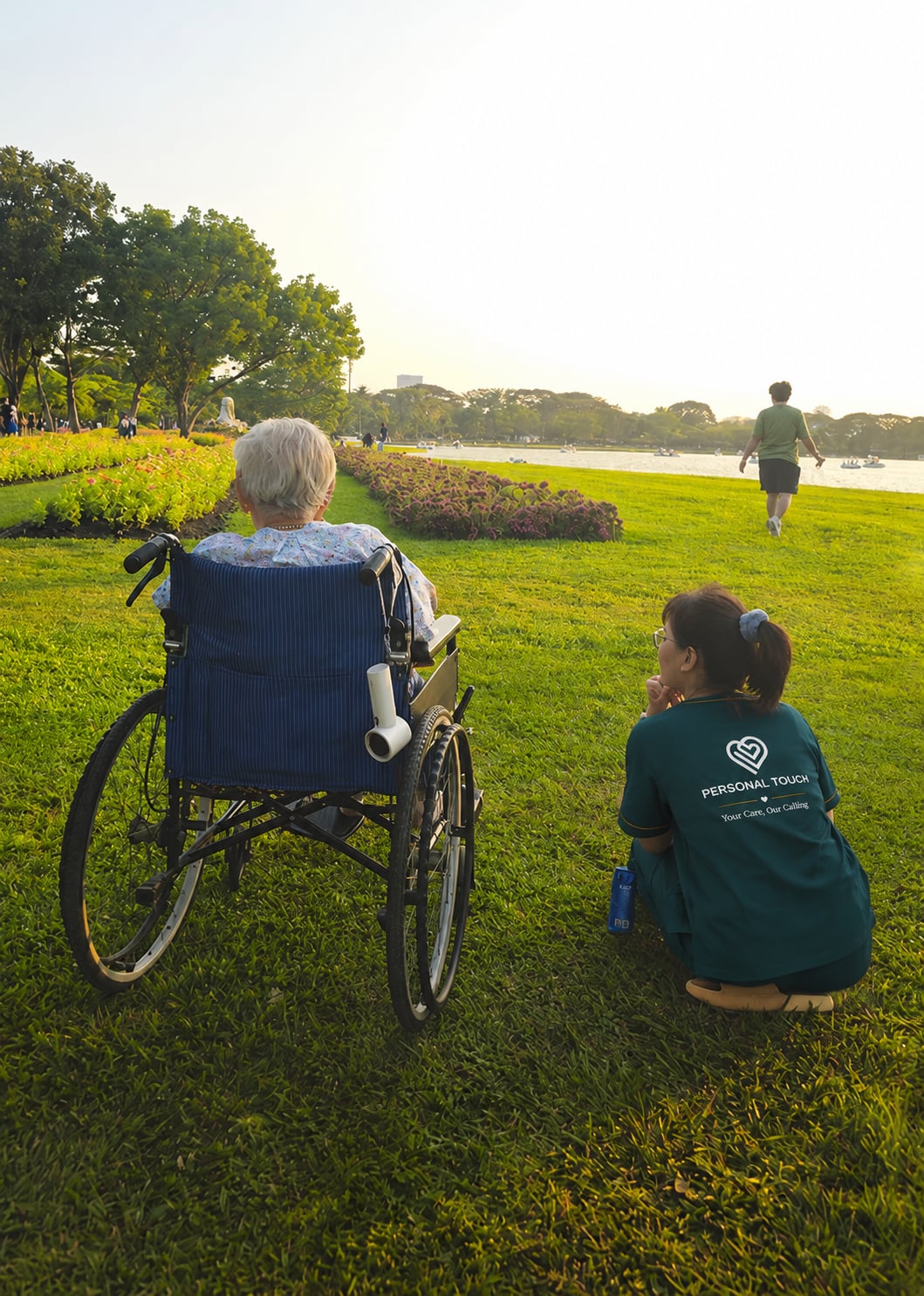 Caretaker with senior outdoors